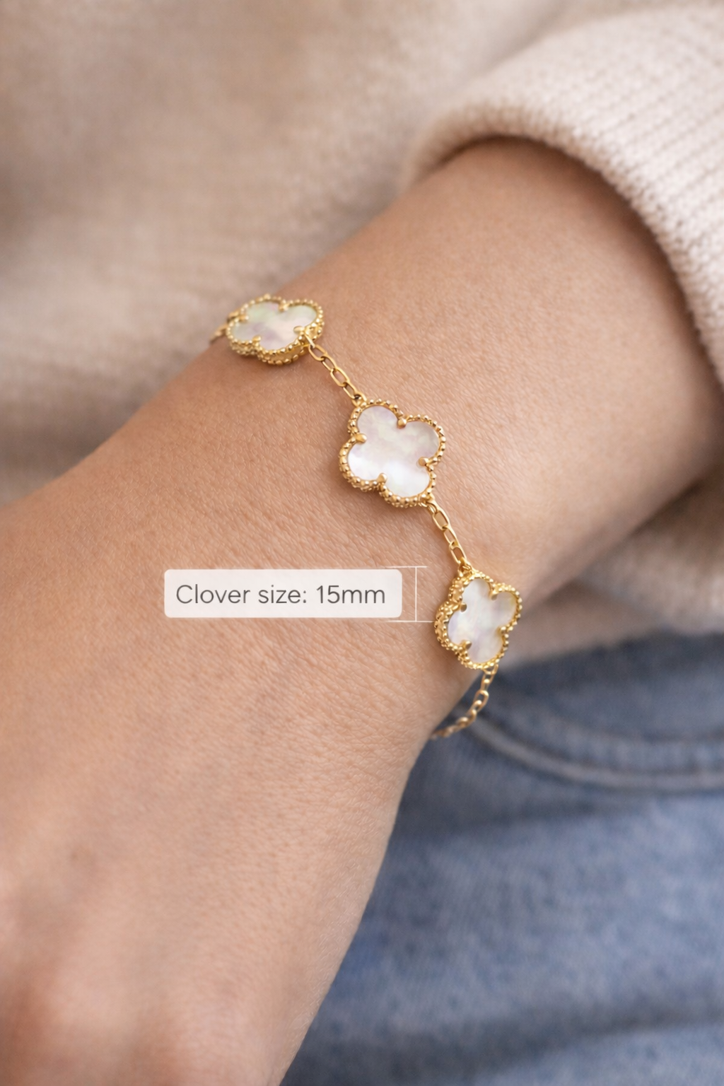 Close view of mother of pearl clover bracelet in 925 sterling silver with gold plating