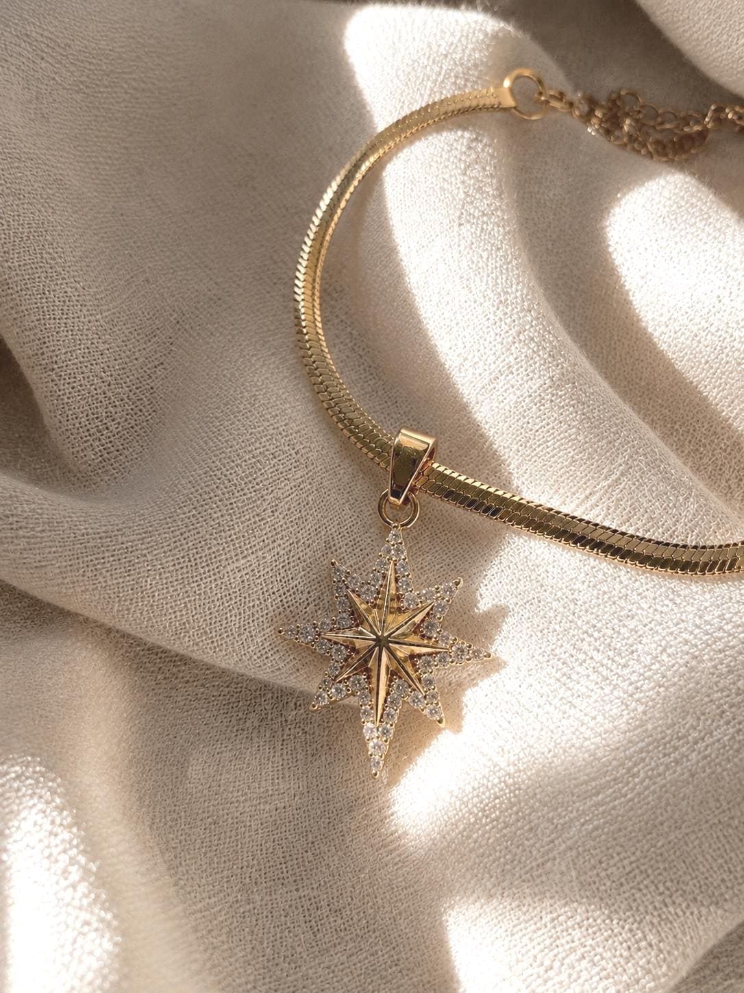 Gold Starburst Necklace for Women, 18K Gold Plated Stainless Steel, CZ North Star Pendant, Adjustable Herringbone Chain, Tarnish Resistant